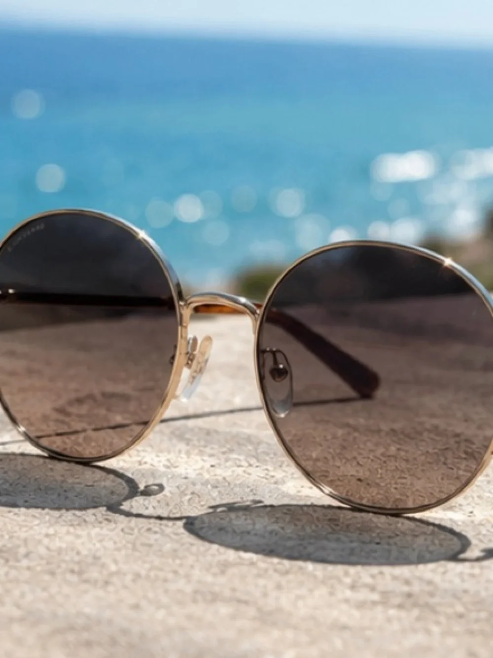 Longchamp Gold Frame Sunglasses with Brown Gradient Lenses